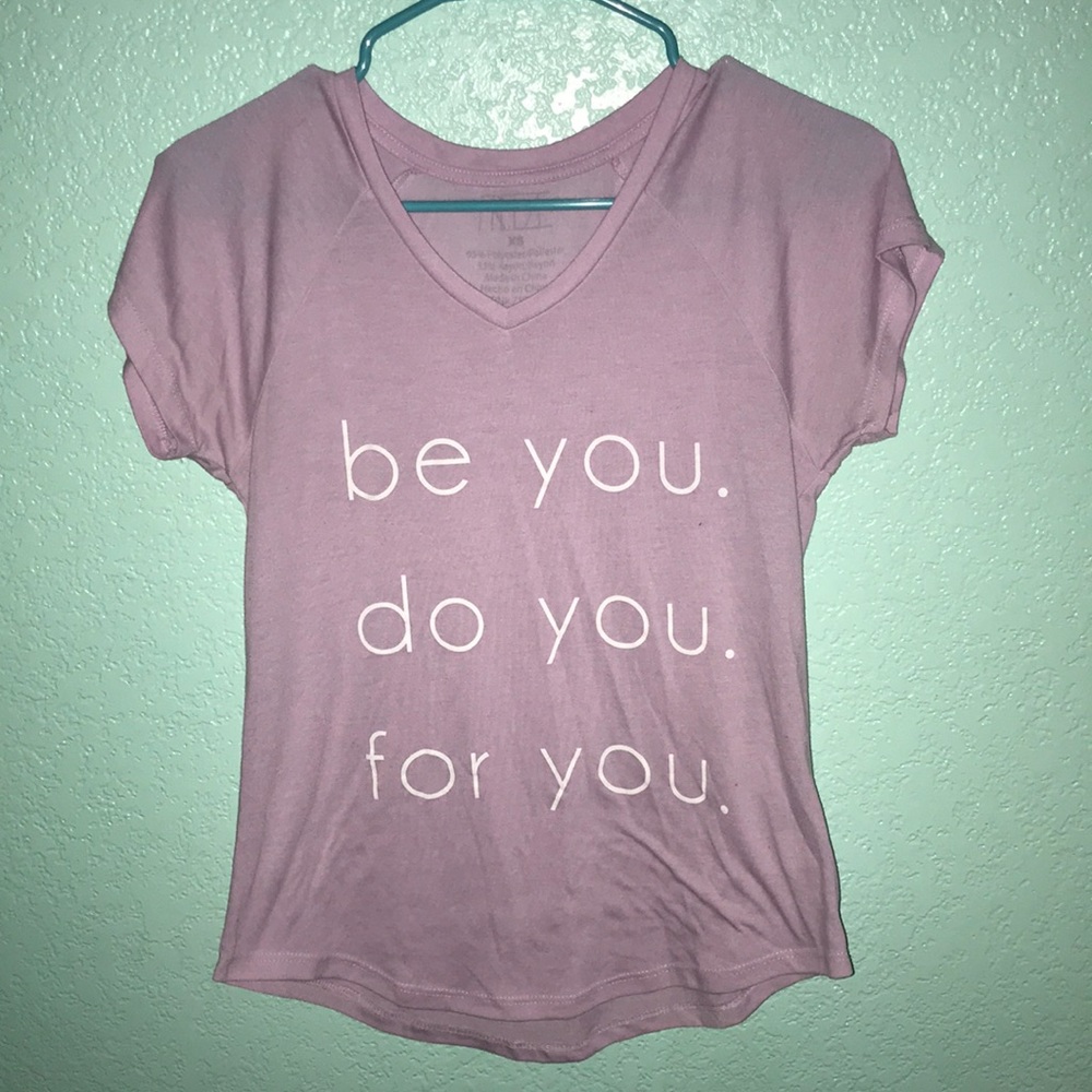 Lilac or light purple shirt.